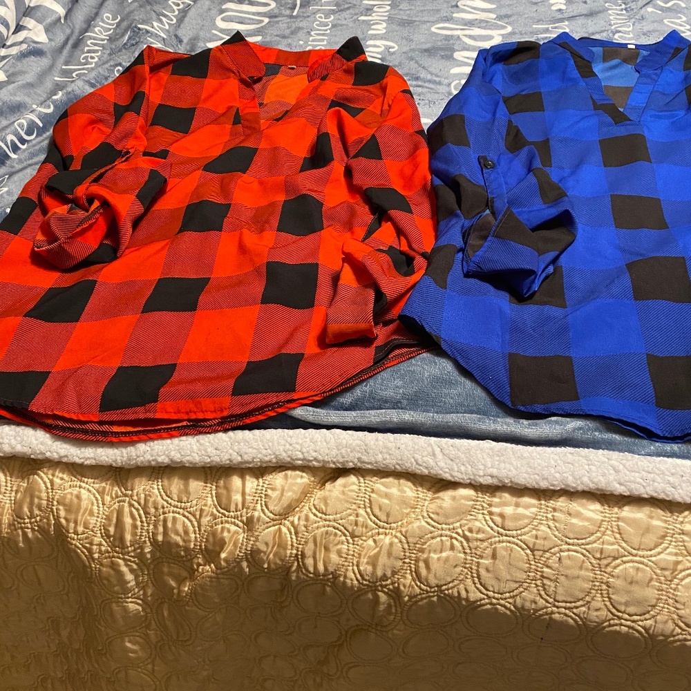 Two shirts lumber jack prints a red and a blue one size L